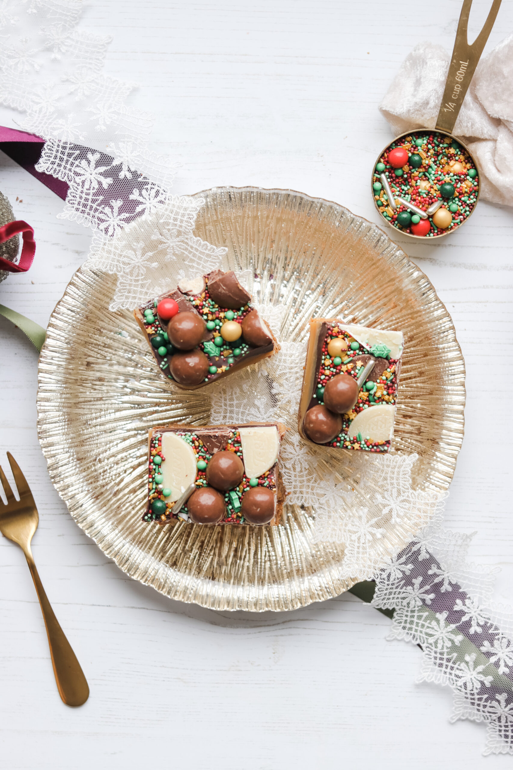 Festive Millionaire’s Recipe with buttery shortbread, silky caramel, and glossy chocolate topping, perfect for holiday baking.